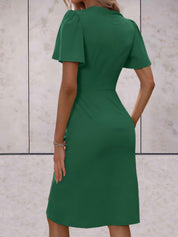Mia | Elegante Abito a Portafoglio con Scollo a V 6