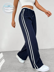 Sophie | Eleganti Pantaloni Sportivi Con Strisce Bianche a Gamba Larga 0