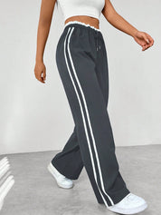 Sophie | Eleganti Pantaloni Sportivi Con Strisce Bianche a Gamba Larga 3