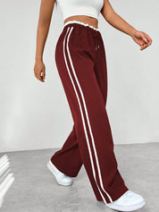 Sophie | Eleganti Pantaloni Sportivi Con Strisce Bianche a Gamba Larga 8