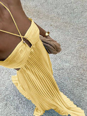 Maxi dress donna scollo halter con cut-out laterali e gonna plissé svasata