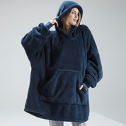 Vista laterale della felpa coperta oversize con tasca canguro profonda