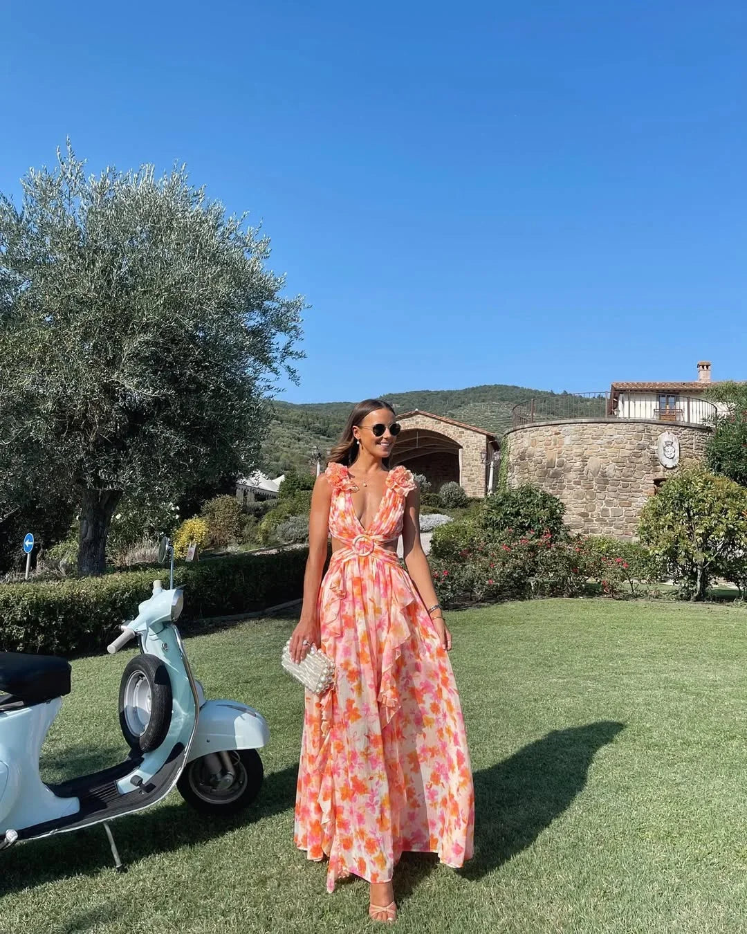 Flora dress floreale rosa dettaglio cut-out laterale