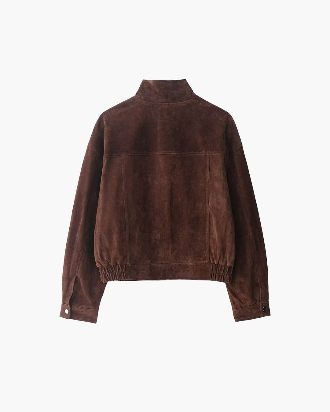 Dettaglio finitura soft-touch e hardware sobrio su giacca faux suede donna