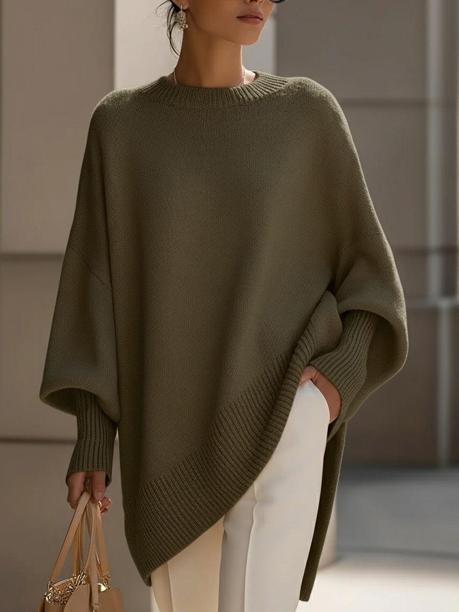 Vista posteriore poncho donna oversize in maglia rosa