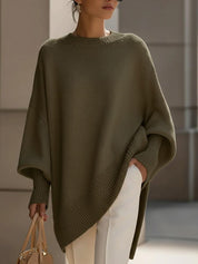Vista posteriore poncho donna oversize in maglia rosa