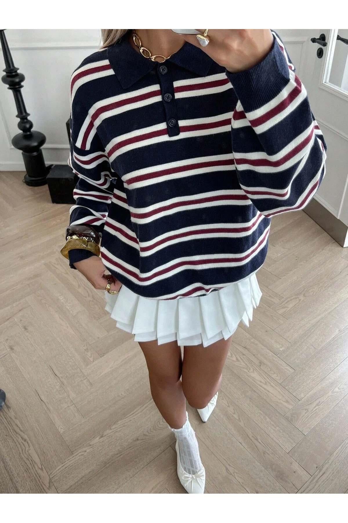 Pullover polo donna autunnale blu navy con pattern a righe
