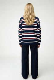 Pullover femminile tricot a righe con bottoni sul collo