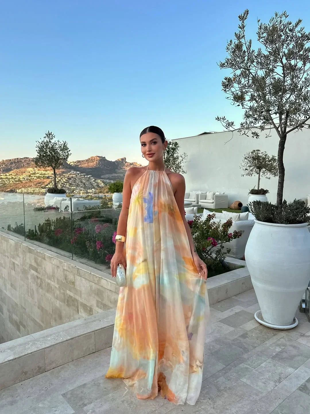 Maxi dress donna con schiena scoperta e stampa arancione vivace