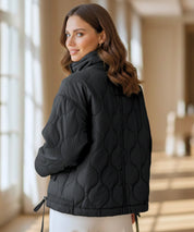 Piumino oversize da donna in color moka, vista frontale