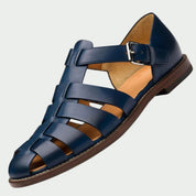 Sandali gladiatore uomo pelle blu scuro indossati in estate