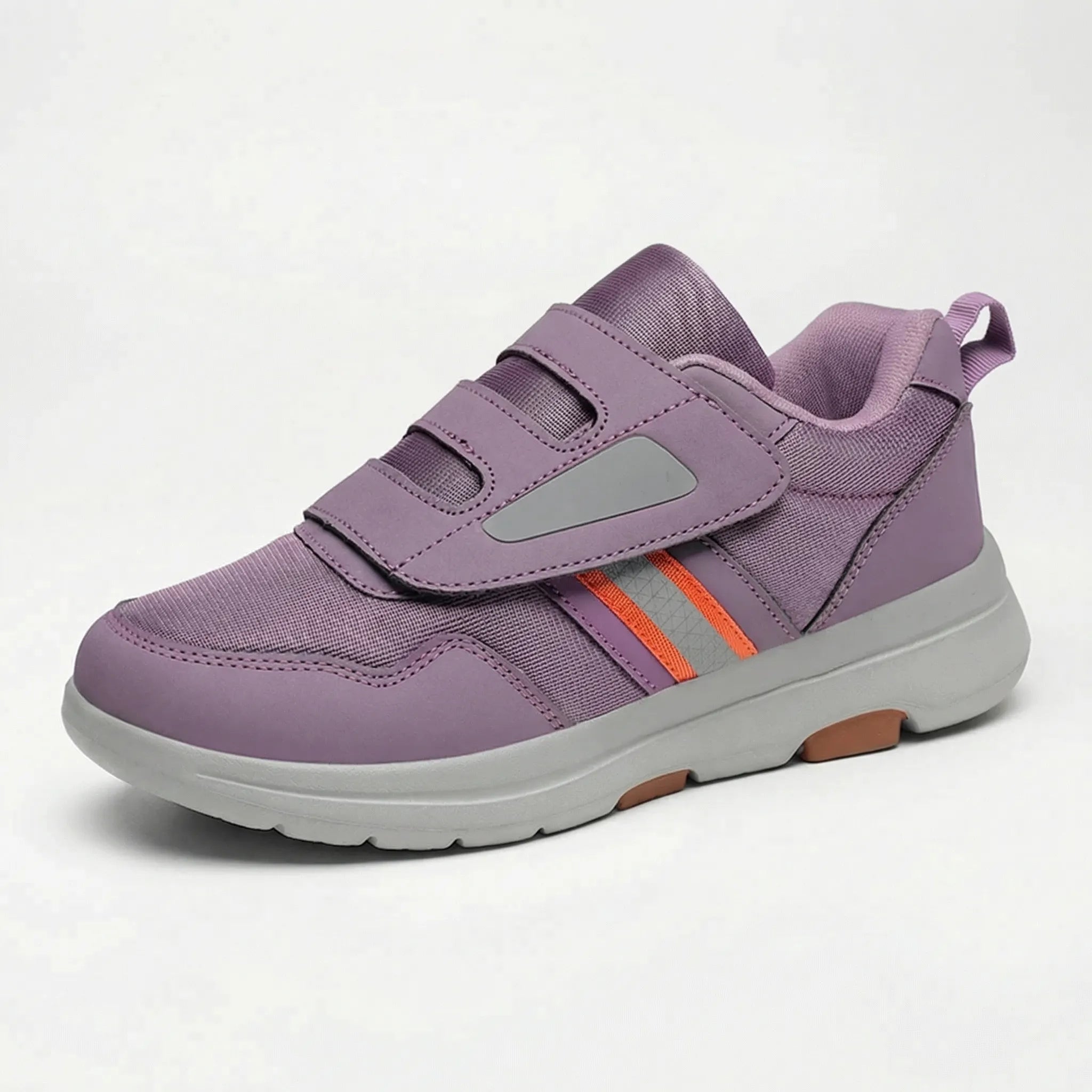 Sneaker ortopedica grigia con suola flessibile bianca, vista laterale