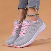 Vista laterale delle sneaker ortopediche Arion grigie unisex