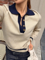 Top donna color block abbinato a pantaloni sartoriali per look da ufficio