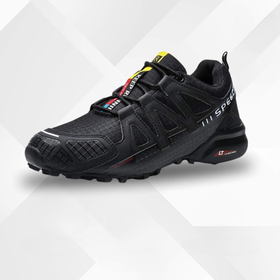 Trekko sneaker colore nero-rosso su sentiero di montagna